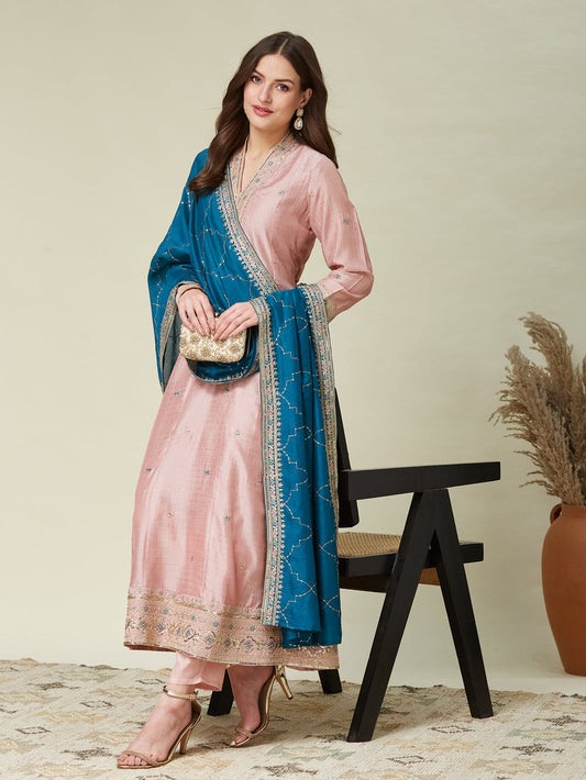 The Pink Embroidered Silk Anarkali Kurta with Dupatta Set is a graceful and elegant ensemble crafted from rich silk fabric.