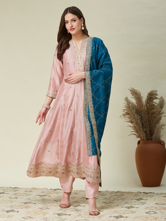 The Pink Embroidered Silk Anarkali Kurta with Dupatta Set is a graceful and elegant ensemble crafted from rich silk fabric.