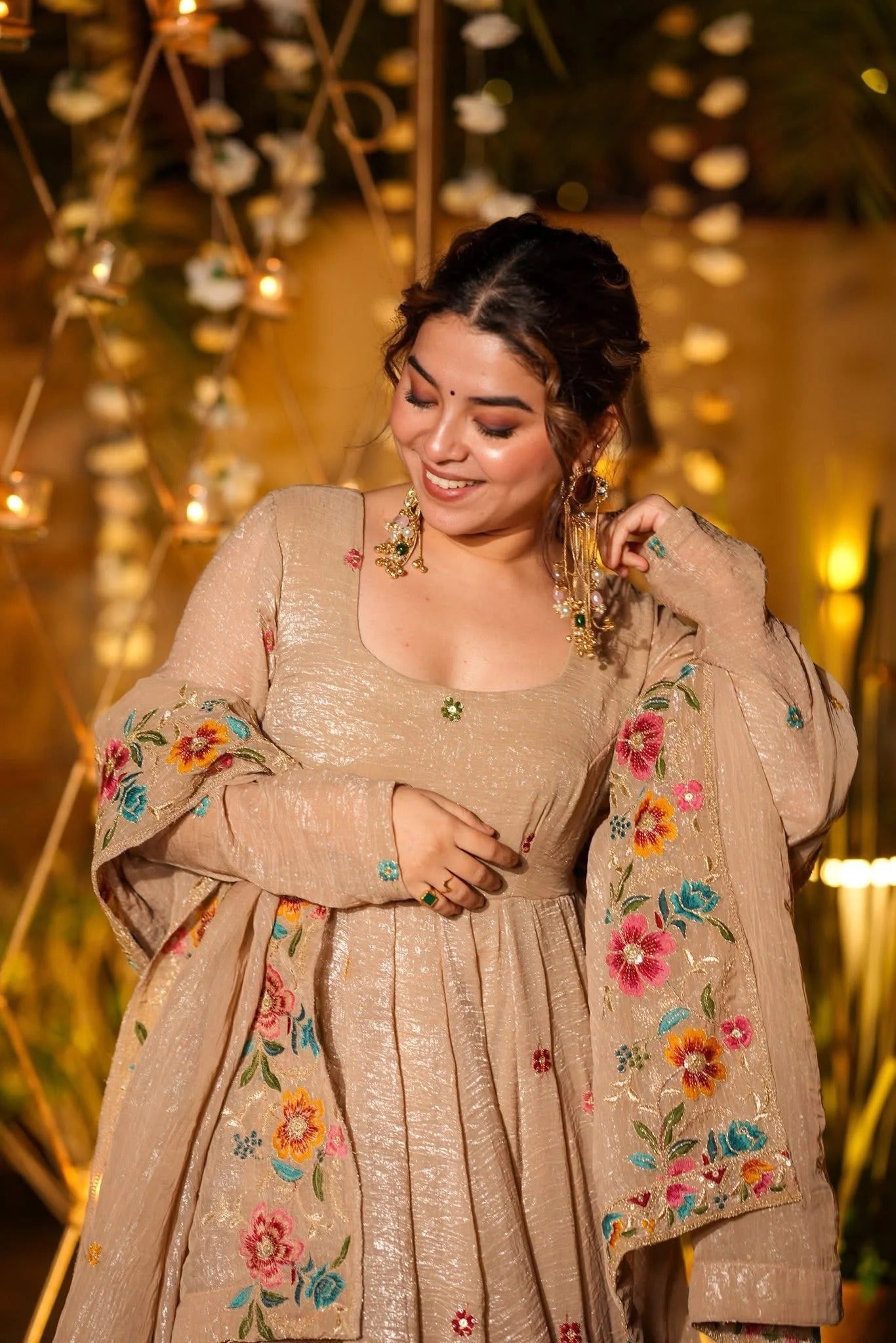 This dress will come with kranchi fabric, it is a very soft fabric and there will be a matching shining on the fabric, it will look as if the fabric is soft